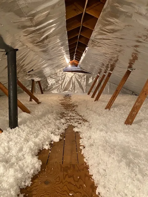 Attic insulation work by 4 Seasons