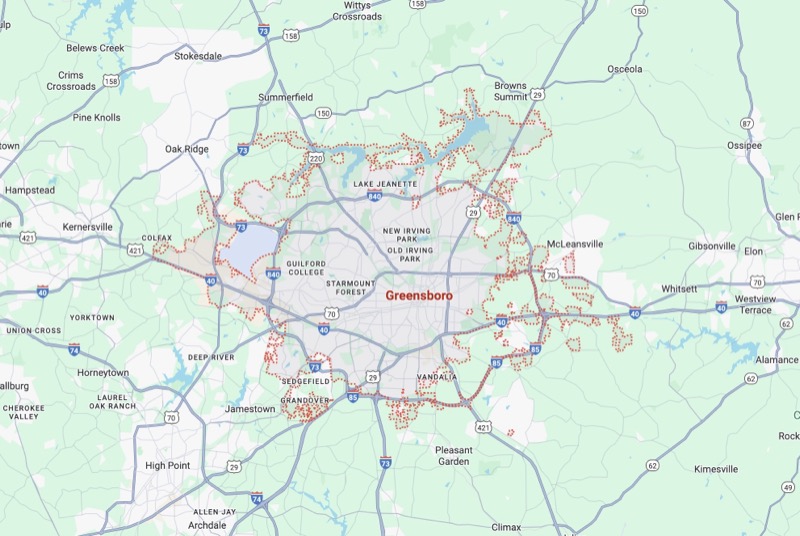 Service area map showing Greensboro NC and surrounding communities including Browns Summit, Oak Ridge, Summerfield, Pleasant Garden, McLeansville, Stokesdale